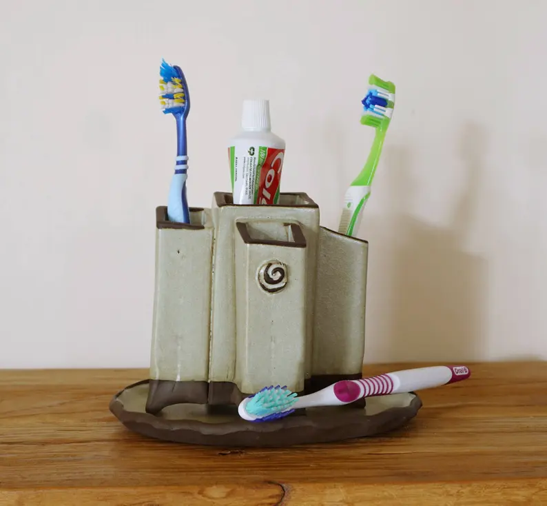 Squared toothbrushes container,